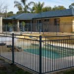 Flat Top Pool Fencing with Raked Panel