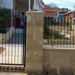 Wrought Iron Infill Fencing with Arched Gate